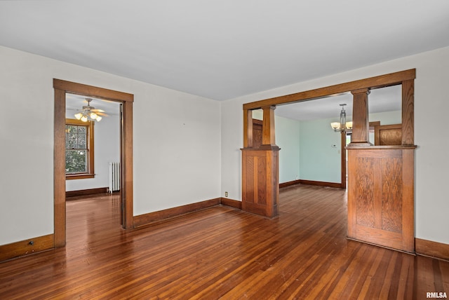 408 E Henry St, Atkinson, IL 61235 - unfurnished room with radiator heating unit, hardwood / wood-style flooring, baseboards, and a chandelier