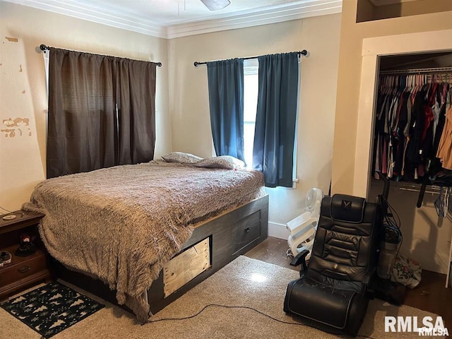 bedroom with ornamental molding, baseboards, and wood finished floors