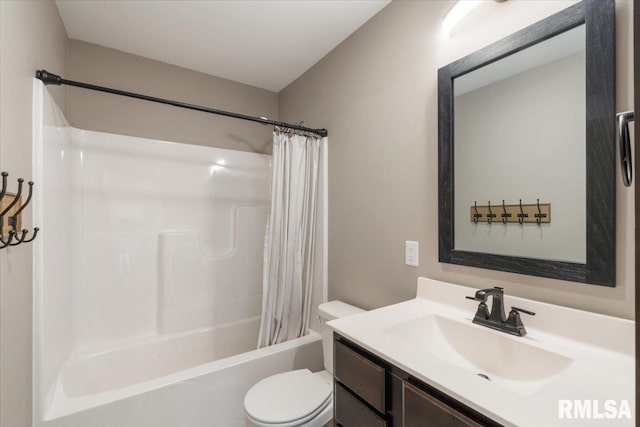 bathroom featuring toilet, vanity, and shower / tub combo with curtain