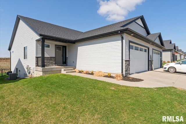 view of front of property with a garage, stone siding, a front lawn, a shingled roof, and driveway