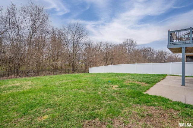 view of yard with a patio and fence