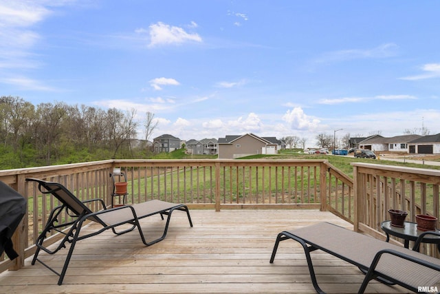 6817 Timber Ct, Bettendorf, IA 52722 - deck with a residential view and a lawn