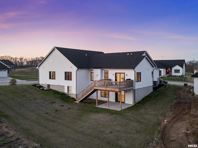 6817 Timber Ct, Bettendorf, IA 52722 - back of house featuring a wooden deck, a patio, stairs, and a yard