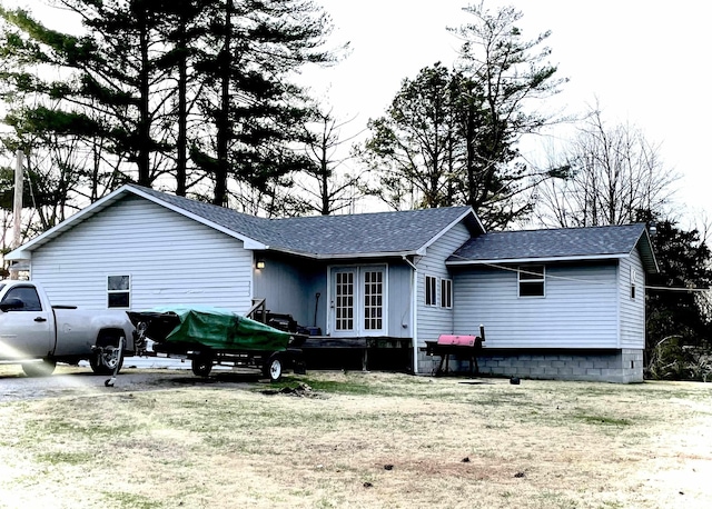 225 Arrowhead Dr, Goreville, IL 62939 - rear view of property with a yard and a shingled roof