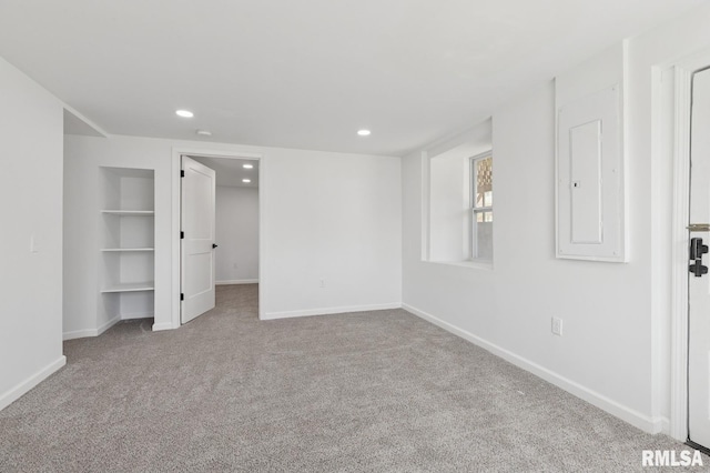 unfurnished bedroom with recessed lighting, baseboards, and carpet floors