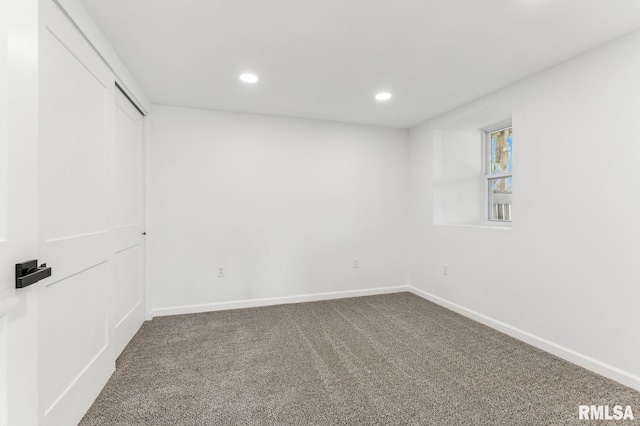 carpeted spare room with recessed lighting and baseboards