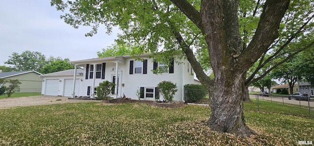 1606 Middle Rd, Camanche, IA 52730 - split foyer home featuring a garage and driveway