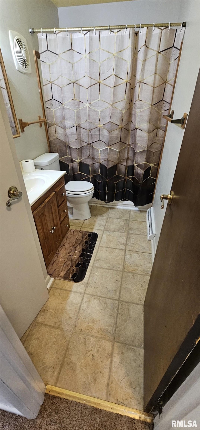 1606 Middle Rd, Camanche, IA 52730 - full bathroom with toilet, vanity, and curtained shower