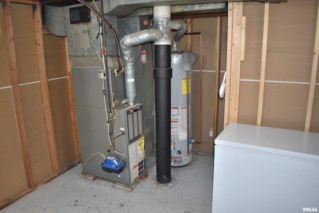 utility room with heating unit and gas water heater