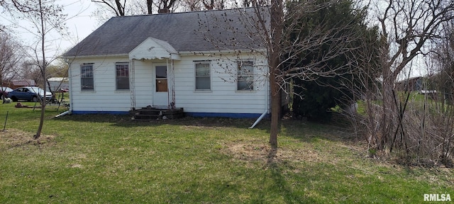 18304 W 206th St, Buffalo Prairie, IL 61237 - cape cod-style house featuring a shingled roof, a chimney, entry steps, and a front yard
