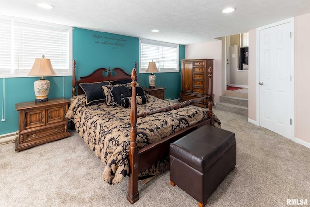 505 W College St, Energy, IL 62933 - bedroom with baseboards, carpet flooring, recessed lighting, and a baseboard radiator
