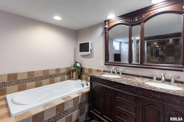 505 W College St, Energy, IL 62933 - bathroom with a shower stall, a garden tub, a sink, and double vanity