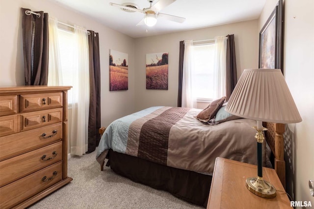 505 W College St, Energy, IL 62933 - bedroom featuring light colored carpet and ceiling fan