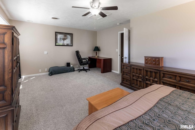505 W College St, Energy, IL 62933 - carpeted bedroom with baseboards, a ceiling fan, and visible vents