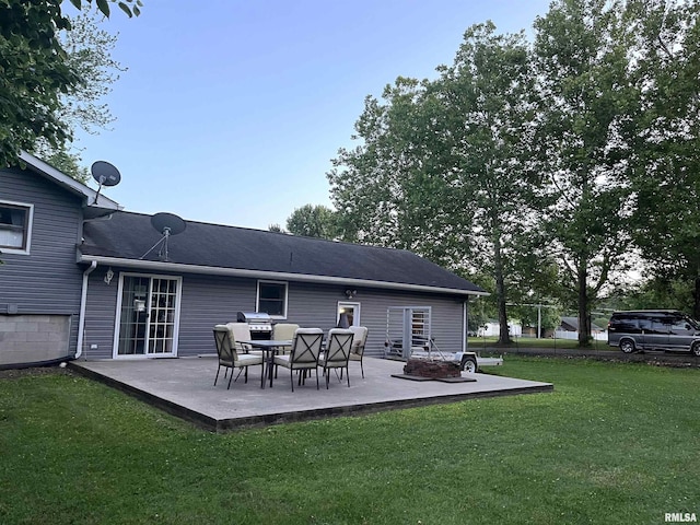 505 W College St, Energy, IL 62933 - rear view of house featuring a yard and a patio