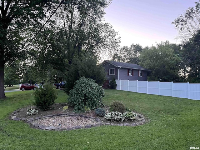 505 W College St, Energy, IL 62933 - yard at dusk with fence