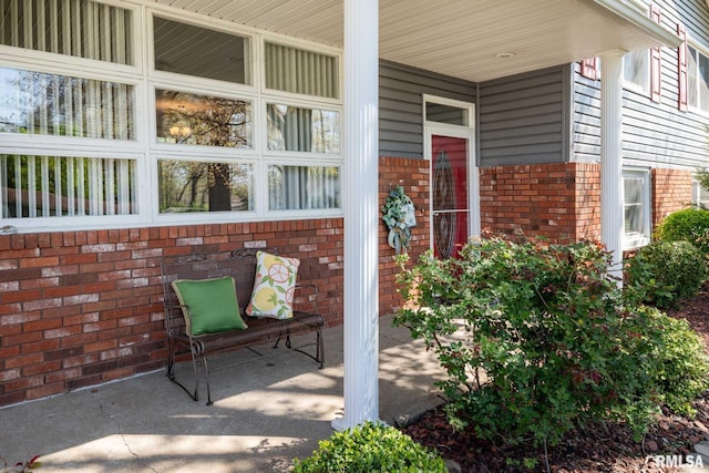 505 W College St, Energy, IL 62933 - entrance to property featuring brick siding and a porch