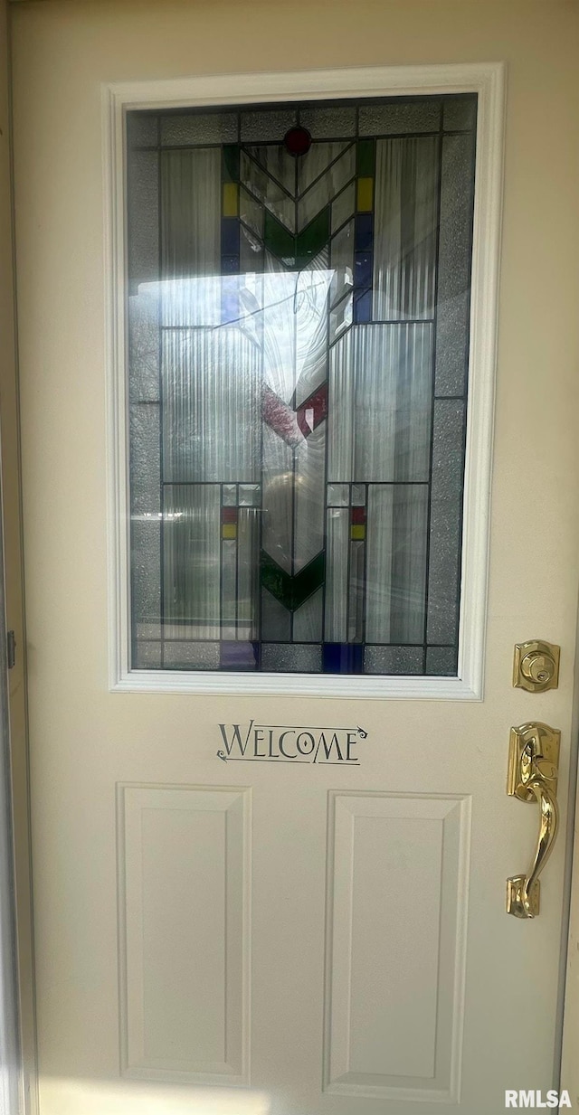 doorway to property with stucco siding