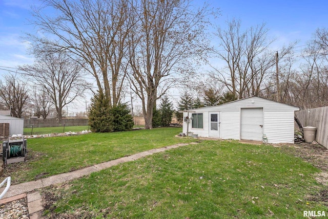 view of yard with a fenced backyard and an outdoor structure
