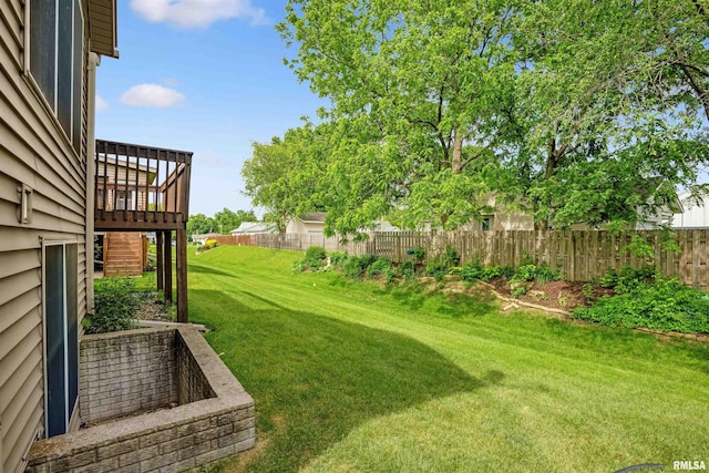 1357 Pinnacle Pines Ct, Bettendorf, IA 52722 - view of yard with a deck