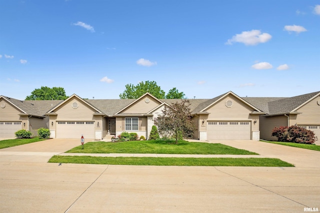 1357 Pinnacle Pines Ct, Bettendorf, IA 52722 - single story home with concrete driveway, a garage, and a front lawn