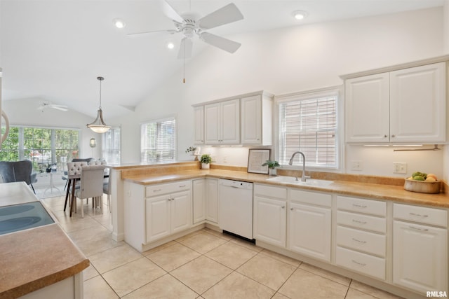 1357 Pinnacle Pines Ct, Bettendorf, IA 52722 - kitchen featuring dishwasher, a sink, a ceiling fan, a peninsula, and vaulted ceiling