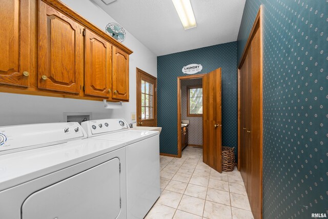 half bathroom featuring plenty of natural light, vanity, toilet, and wallpapered walls