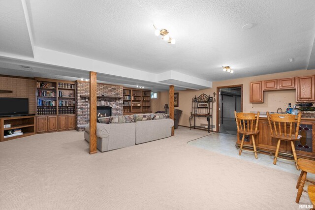 living area featuring a textured ceiling and light colored carpet