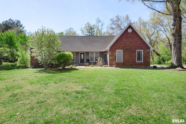 409 Arbor Dr, Carterville, IL 62918 - view of front of property with roof with shingles and a front lawn