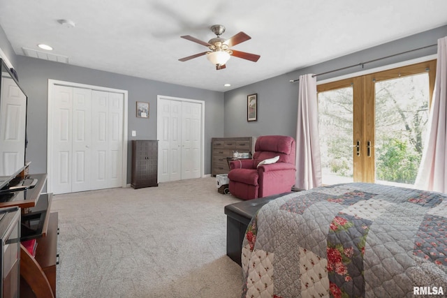 409 Arbor Dr, Carterville, IL 62918 - bedroom with recessed lighting, carpet, a ceiling fan, french doors, and two closets
