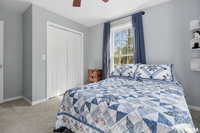 409 Arbor Dr, Carterville, IL 62918 - bedroom with carpet floors, a closet, a ceiling fan, and baseboards