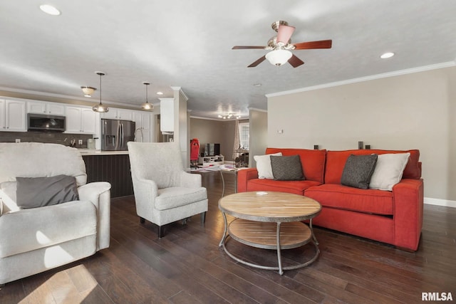 409 Arbor Dr, Carterville, IL 62918 - living area with dark wood finished floors, ceiling fan, and crown molding