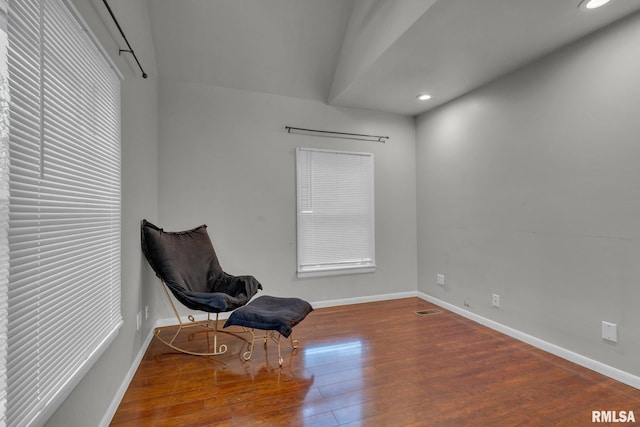 unfurnished room with recessed lighting, wood finished floors, visible vents, and baseboards