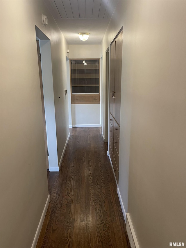 1725 Elmwood Ln, Bettendorf, IA 52722 - hall featuring wood finished floors and baseboards