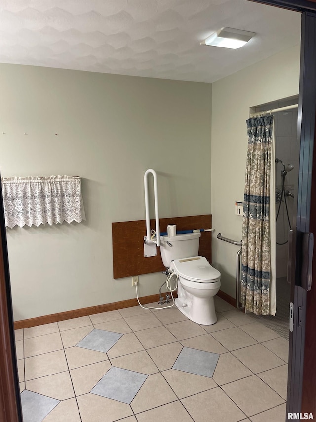5833 Taylor St, Davenport, IA 52806 - bathroom featuring tile patterned floors, toilet, curtained shower, and baseboards