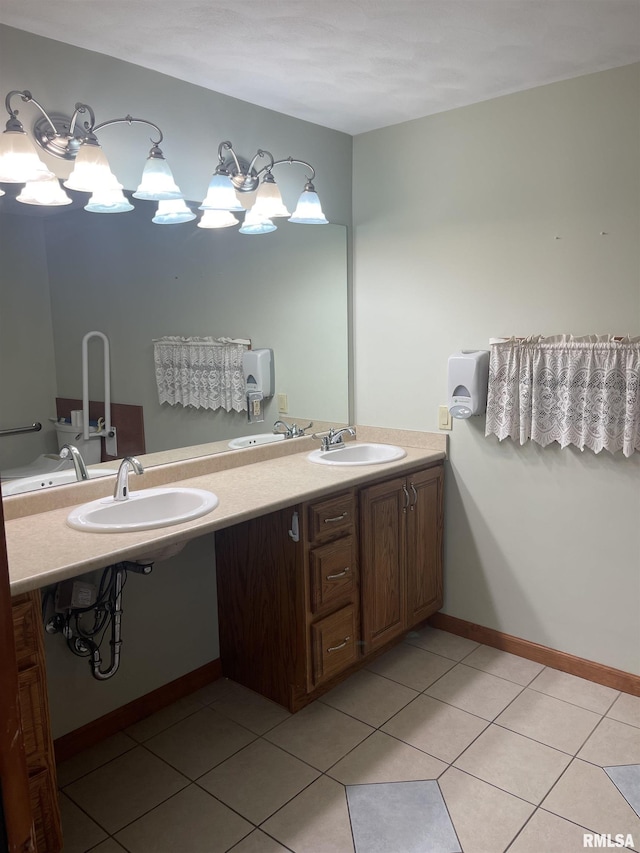 5833 Taylor St, Davenport, IA 52806 - bathroom featuring tile patterned flooring and double vanity