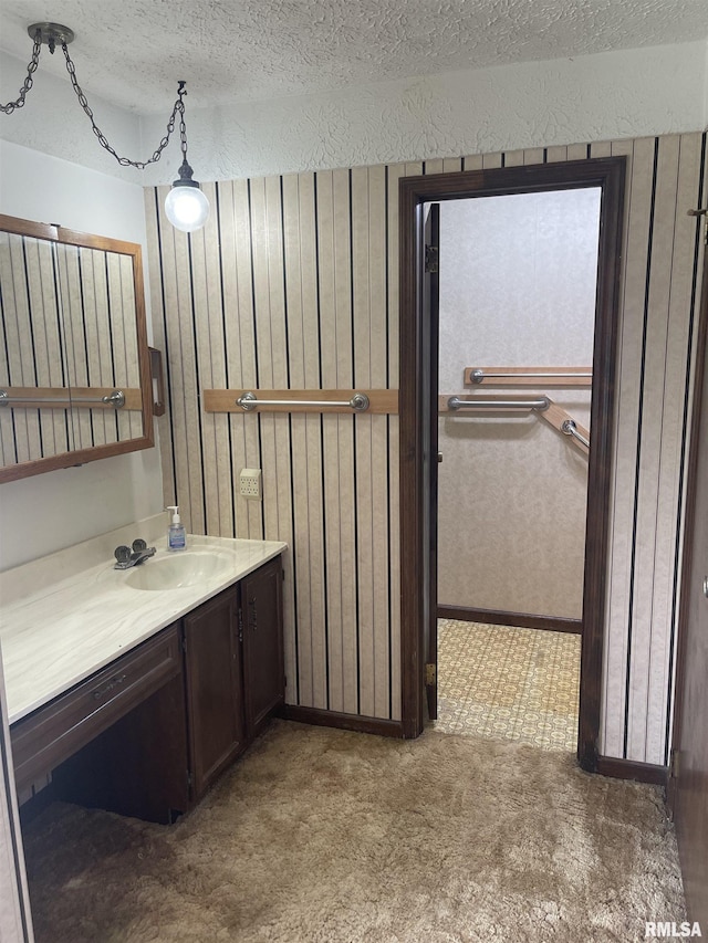 5833 Taylor St, Davenport, IA 52806 - bathroom with a textured ceiling and vanity