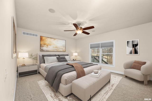bedroom featuring baseboards, visible vents, a ceiling fan, and light colored carpet