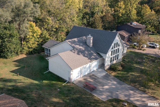 bird's eye view featuring a view of trees