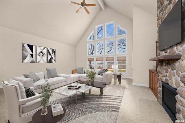 living room featuring a fireplace, ceiling fan, high vaulted ceiling, and light carpet