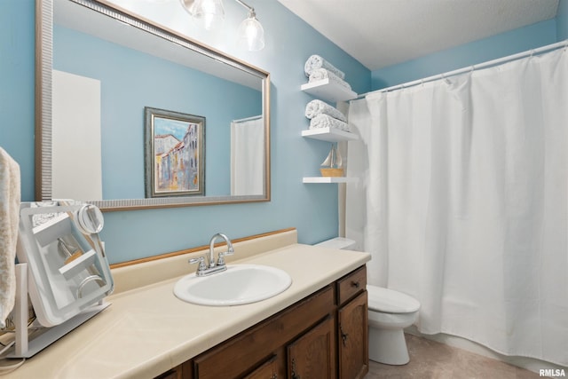 full bath with vanity, curtained shower, and toilet
