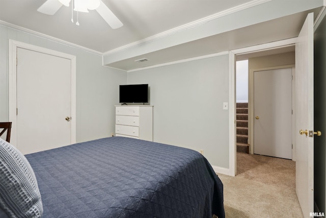 bedroom with light colored carpet, a ceiling fan, crown molding, and visible vents