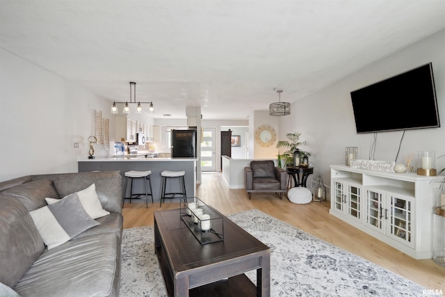 living room with light wood finished floors