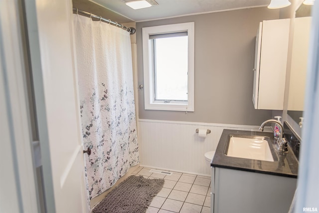1724 E 1324th St, Fowler, IL 62338 - full bathroom with tile patterned floors, toilet, wainscoting, curtained shower, and vanity