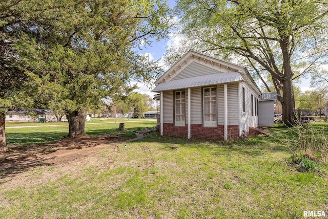 exterior space with a front yard