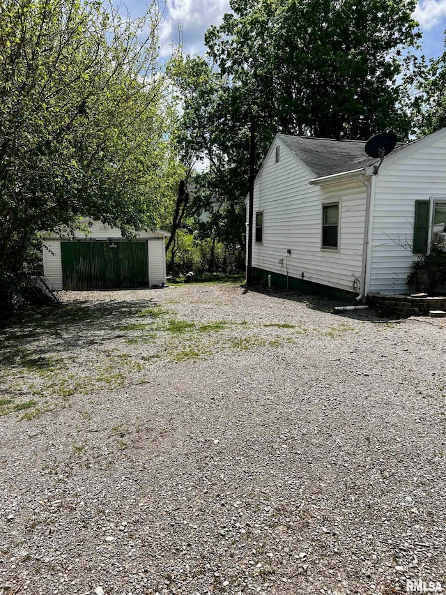 57 W 3rd St, New Burnside, IL 62967 - exterior space featuring driveway
