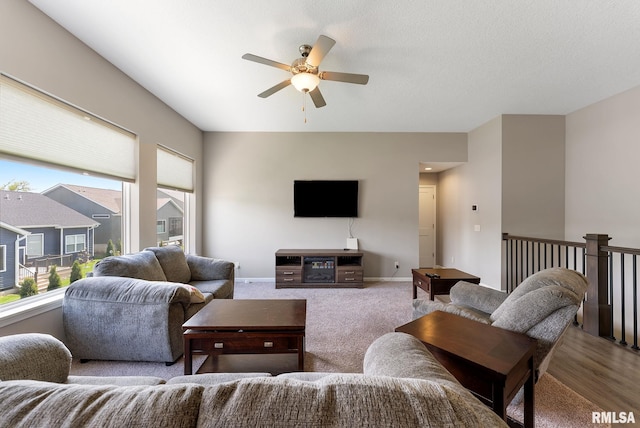 4743 Pheasant Creek Ave, Davenport, IA 52807 - living room with carpet, a ceiling fan, and baseboards