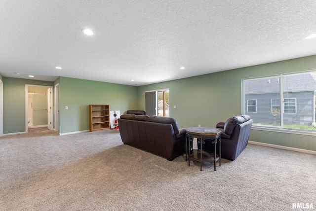 4743 Pheasant Creek Ave, Davenport, IA 52807 - living area with recessed lighting, carpet, and a textured ceiling