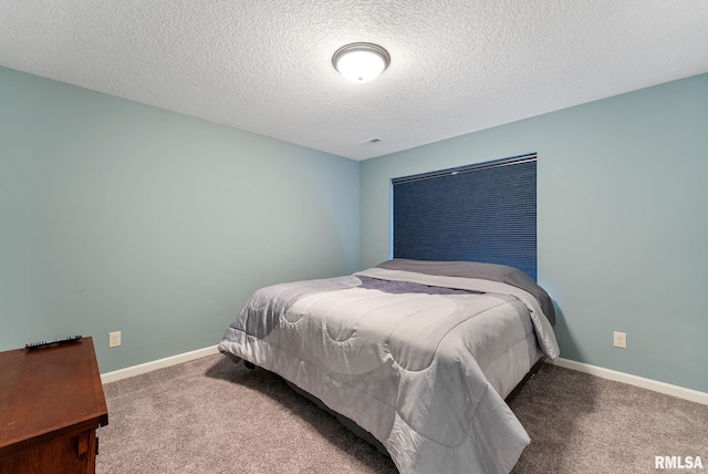 4743 Pheasant Creek Ave, Davenport, IA 52807 - carpeted bedroom with baseboards and a textured ceiling
