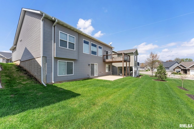 4743 Pheasant Creek Ave, Davenport, IA 52807 - rear view of house with a patio area, a wooden deck, and a yard